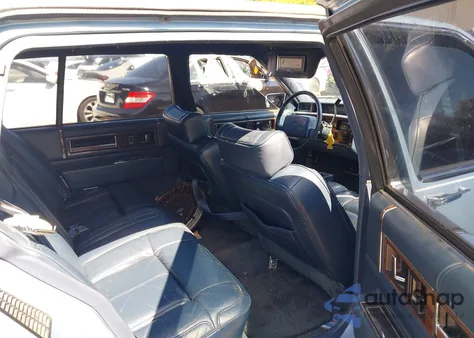 1990 Cadillac Deville из США, поврежденный, VIN 1G6CD5335L4207875